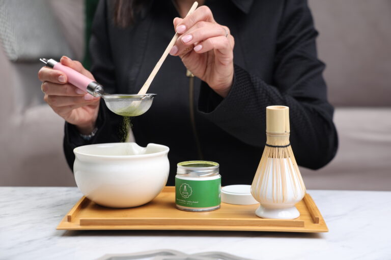 Absolutely! Create a concentrated matcha base using your traditional tools with less water, then pour it over ice and add cold water or milk. The properly whisked base maintains its foam structure even when chilled, something impossible to achieve with shortcuts.
